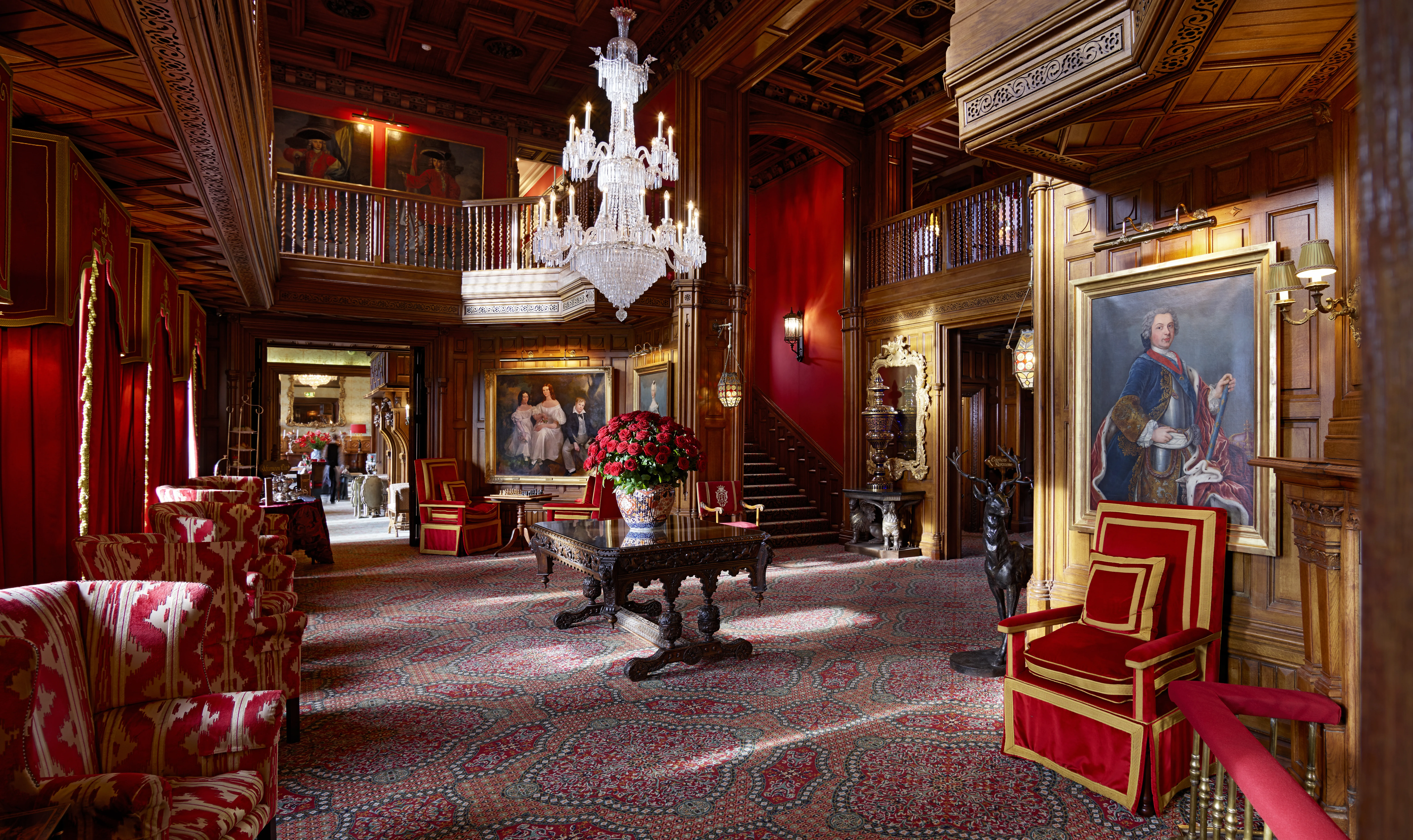 Ashford Castle Great Hall with double-height carved timber ceiling and Baccarat chandelier