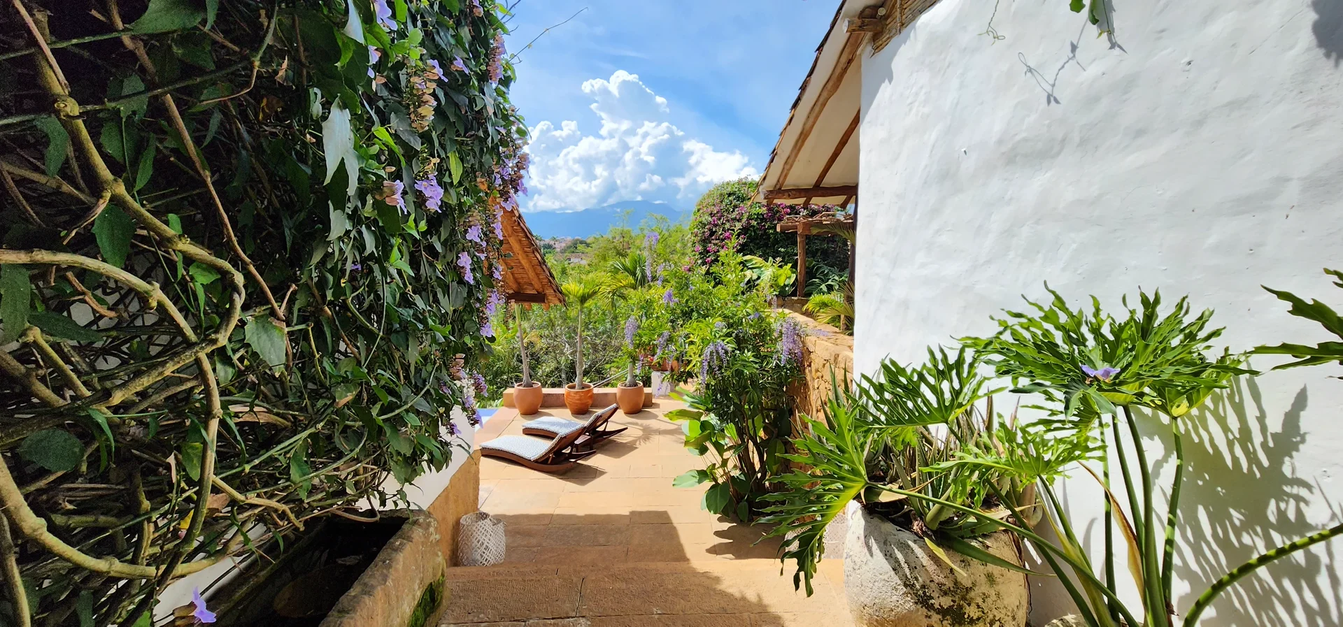 Casa Yahri terrace dining at sunset over the Andes