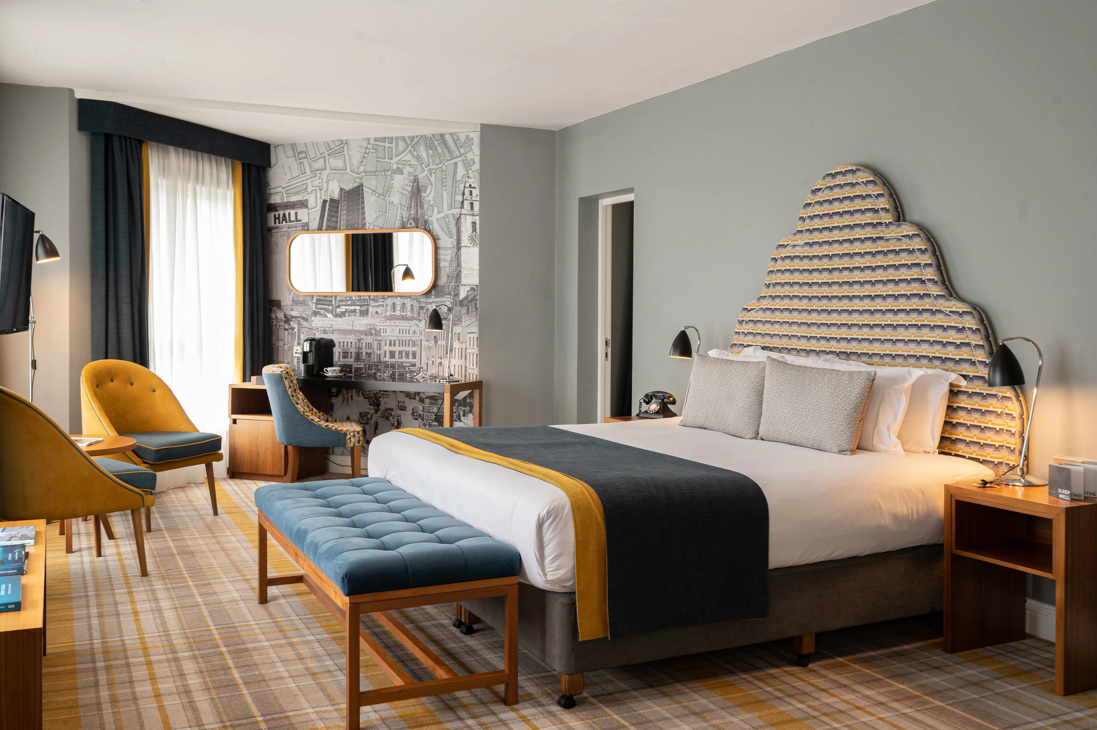The Montenotte Merchant Suite with Cork city map headboard and gold and grey palette